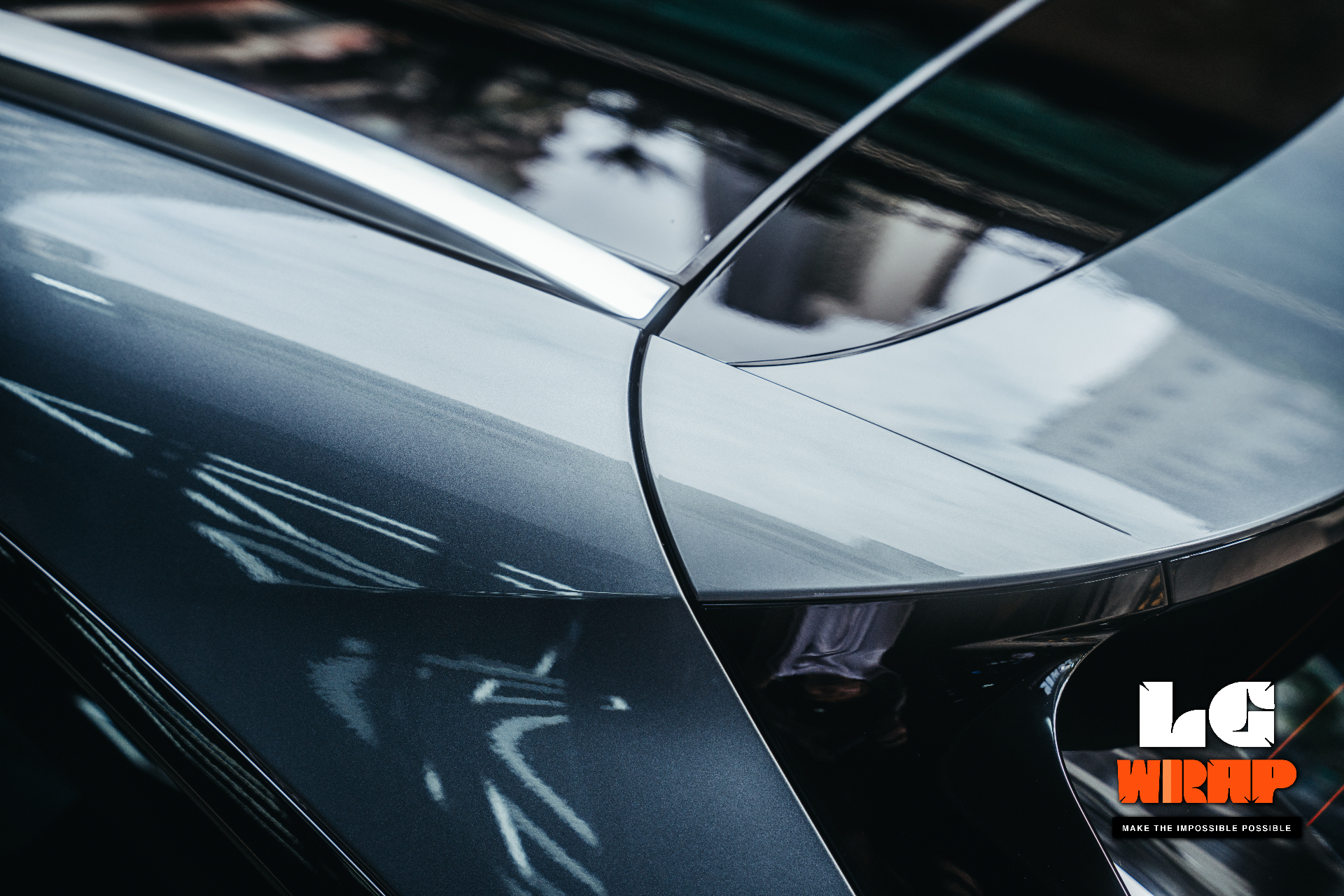 Close-up of dark Porsche body curve and A-pillar edge wrapping detail, showing PPF edge craftsmanship