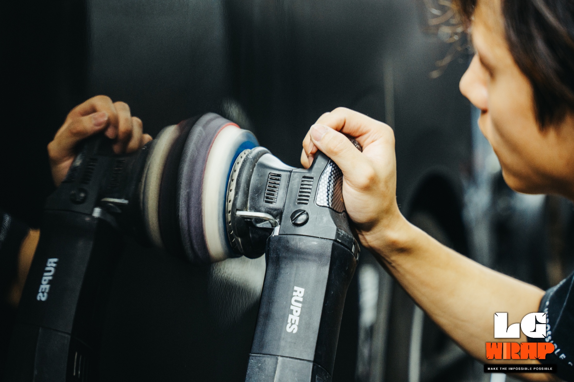 Close-up of RUPES dual-action polisher
