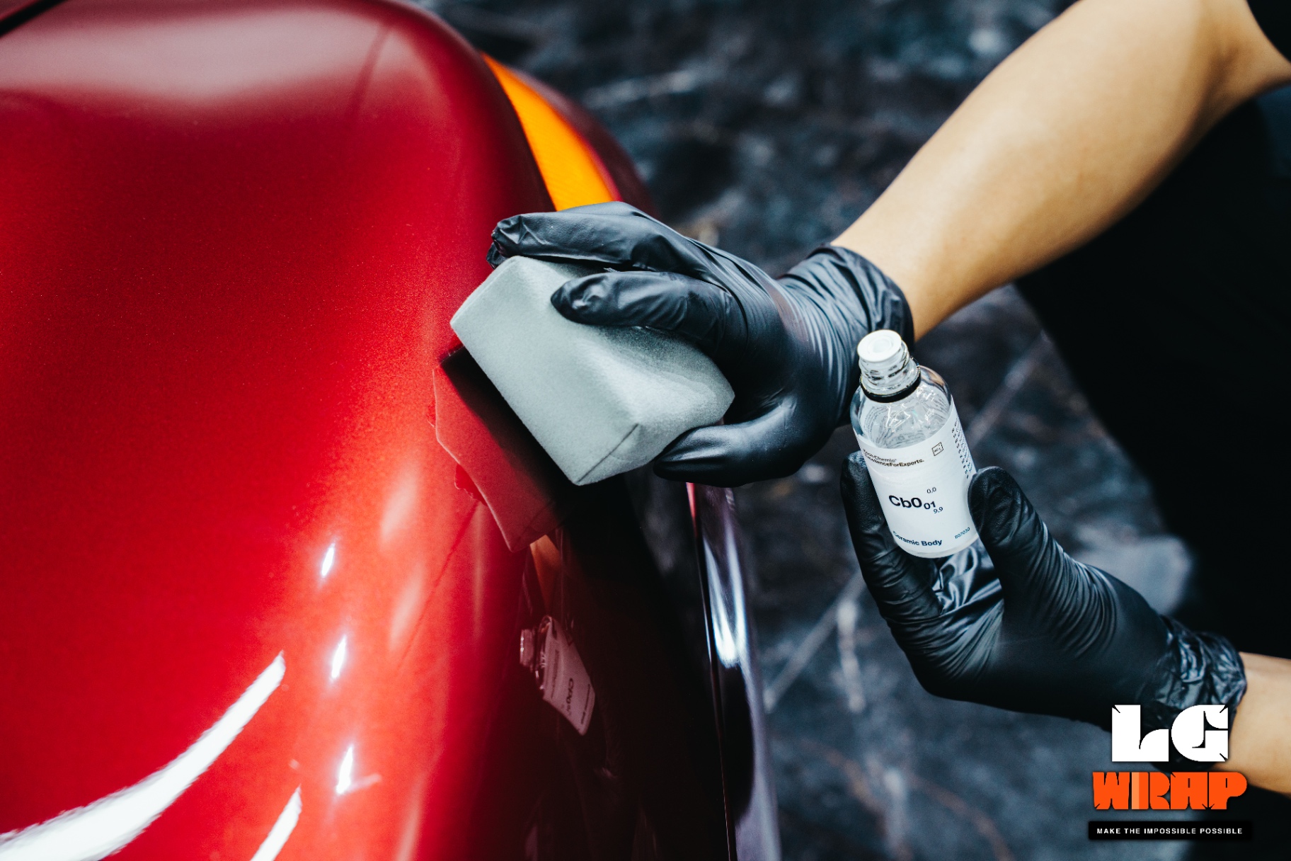 Porsche 993 front fender undergoing Koch-Chemie Cb0.01 ceramic coating application