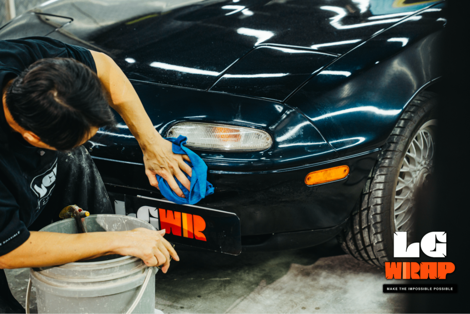 Wet sanding and finishing touches on the Mazda MX-5 NA's front bumper