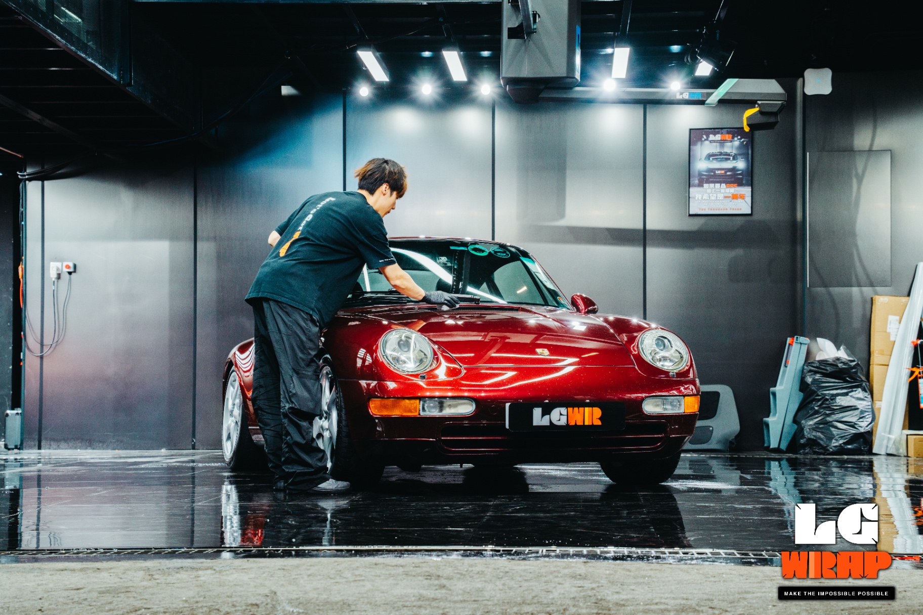 Letsgetwrap technician performing two-bucket deep wash on Porsche 993 for coating preparation